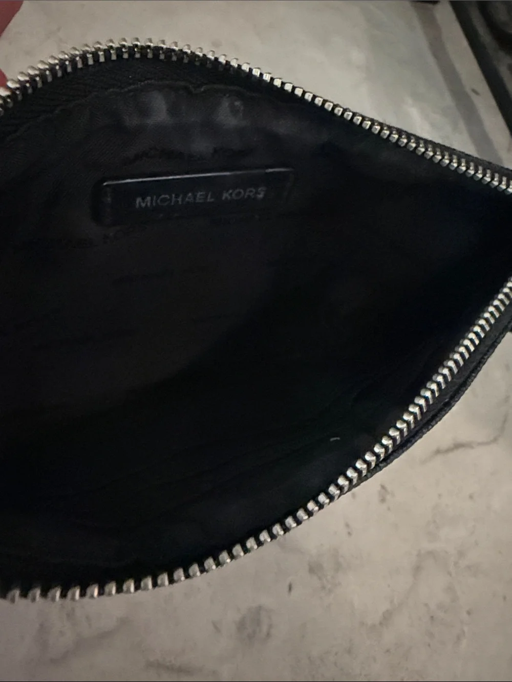 Michael Kors Black MK Signature Zip Wristlet with Silver Plate